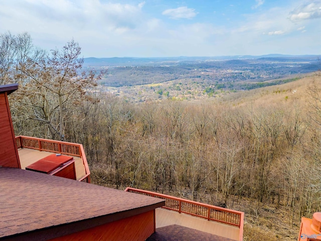 view of mountain feature featuring a forest view