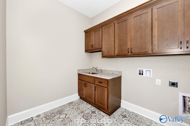 laundry room with light tile patterned flooring, sink, cabinets, electric dryer hookup, and washer hookup