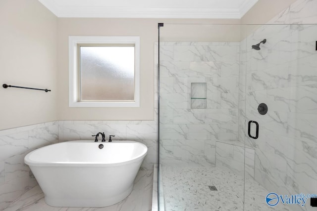 bathroom with crown molding, shower with separate bathtub, and tile walls