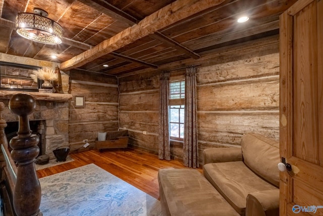 unfurnished room featuring wood ceiling, beam ceiling, and hardwood / wood-style flooring