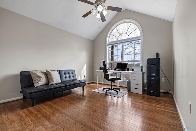 office with ceiling fan, wood-type flooring, and vaulted ceiling