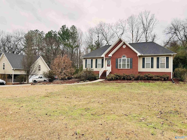 view of front facade with a front lawn