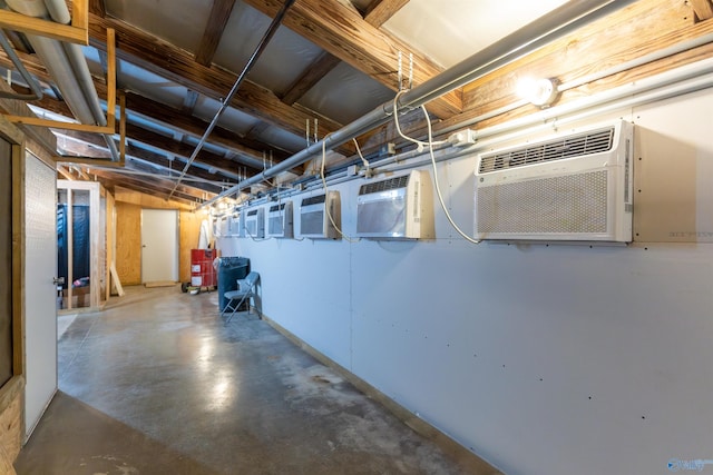 basement with a wall mounted AC