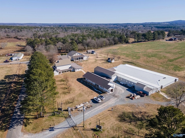 birds eye view of property featuring a rural view