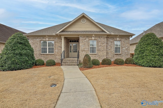 view of front of home with a front lawn