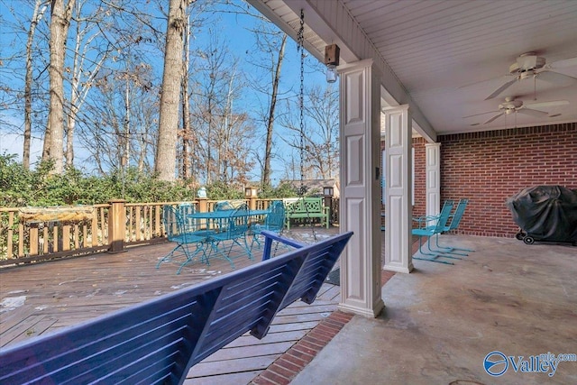 deck with ceiling fan and a grill