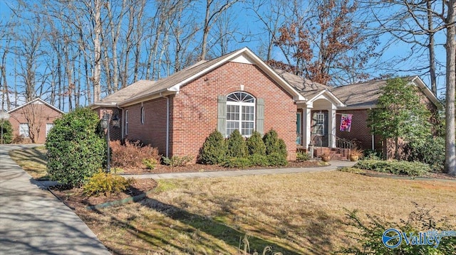 ranch-style home with a front yard