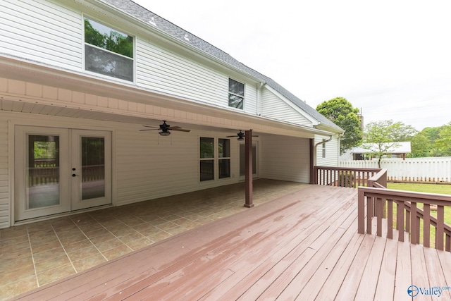 deck featuring fence, ceiling fan, and french doors