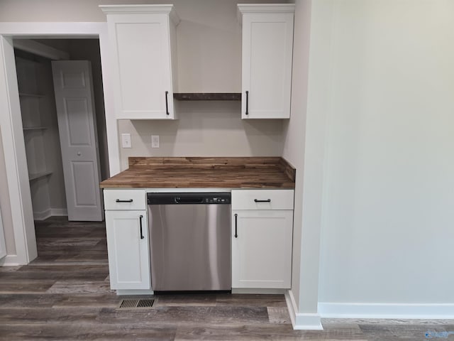 kitchen with white cabinets, dark wood finished floors, wooden counters, and dishwasher