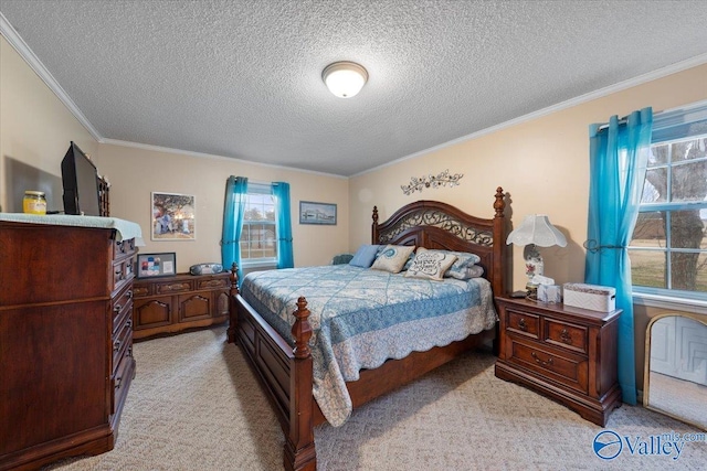 carpeted bedroom featuring ornamental molding and a textured ceiling