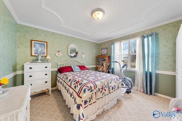 carpeted bedroom with ornamental molding and a textured ceiling