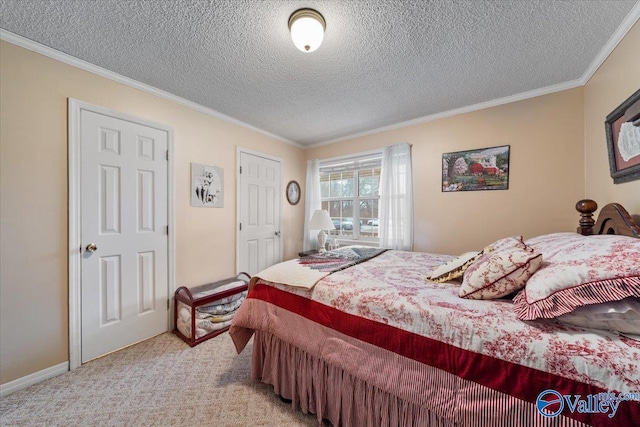 bedroom featuring crown molding, light carpet, and a textured ceiling