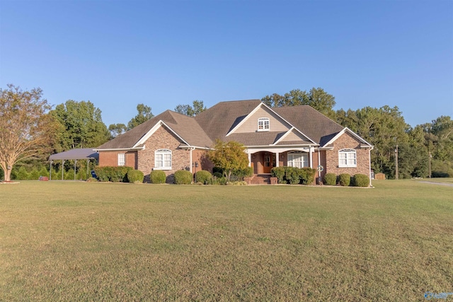 view of front of property with a front yard and covered porch