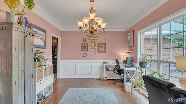 2317 Little Cove Rd, Owens Cross Roads, AL 35763 - office space featuring a chandelier, wood finished floors, ornamental molding, and a wainscoted wall