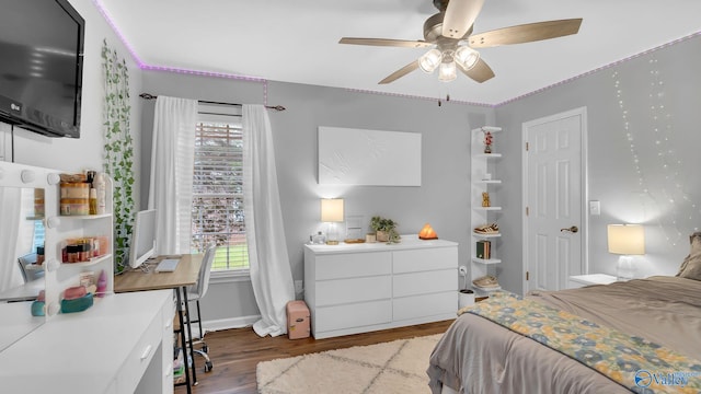 2317 Little Cove Rd, Owens Cross Roads, AL 35763 - bedroom with wood finished floors and a ceiling fan