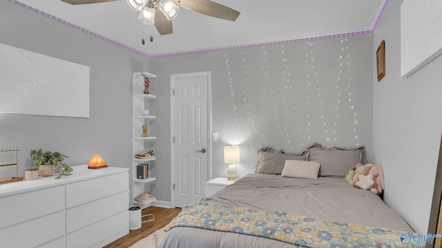 2317 Little Cove Rd, Owens Cross Roads, AL 35763 - bedroom featuring light wood finished floors and ceiling fan