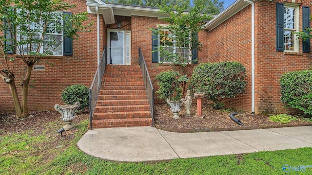 2317 Little Cove Rd, Owens Cross Roads, AL 35763 - doorway to property featuring brick siding