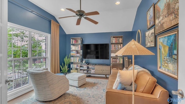 2317 Little Cove Rd, Owens Cross Roads, AL 35763 - living room featuring lofted ceiling, healthy amount of natural light, a ceiling fan, wood finished floors, and recessed lighting