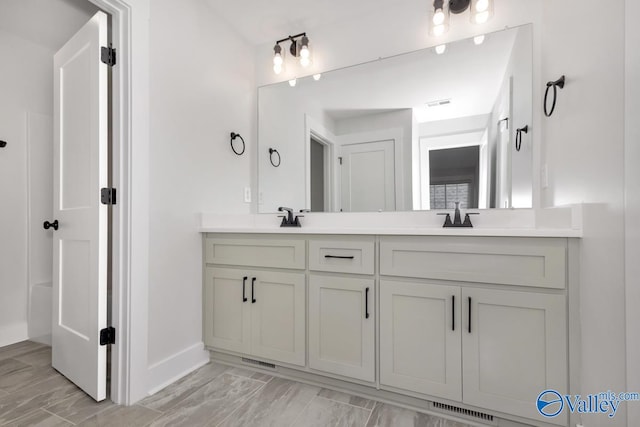 bathroom with double sink vanity