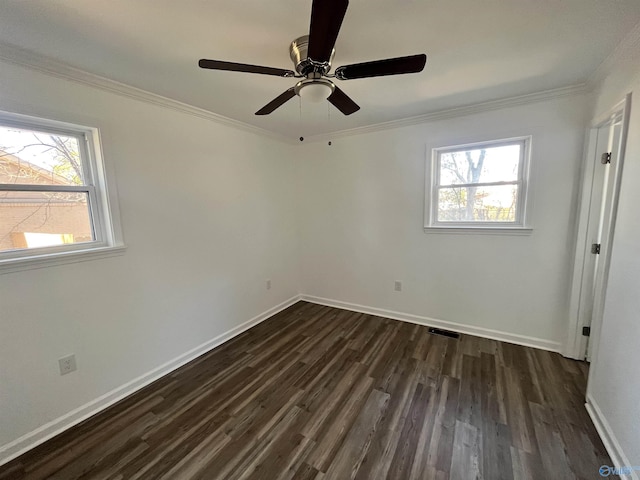 unfurnished bedroom with dark wood-style floors, multiple windows, and crown molding