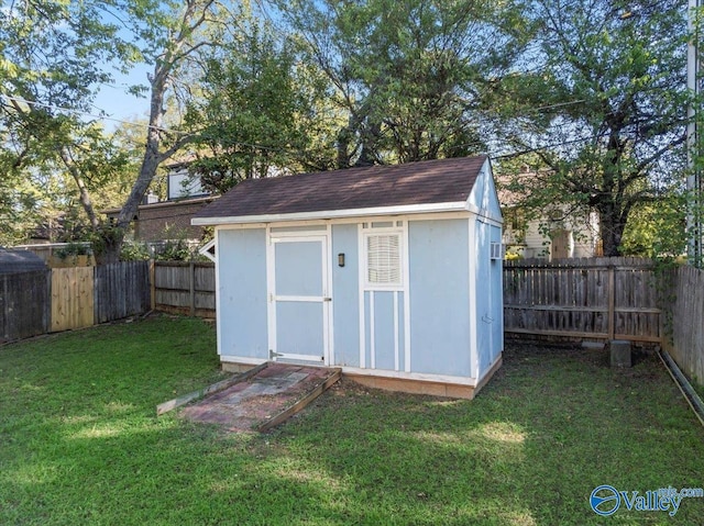 view of outdoor structure featuring a yard