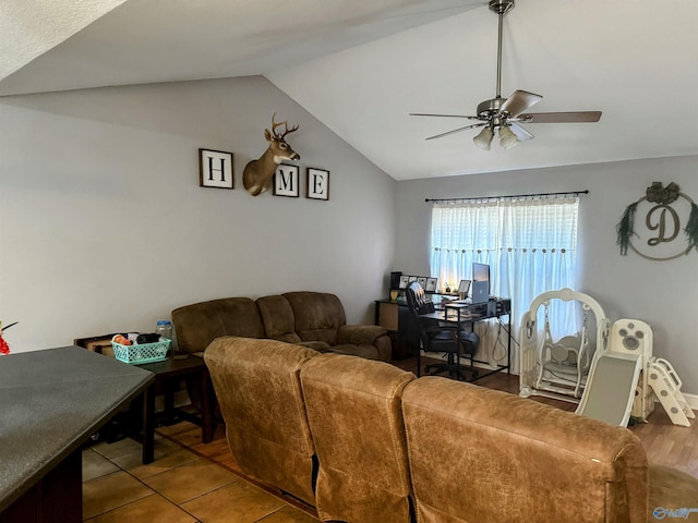 living room with vaulted ceiling and ceiling fan