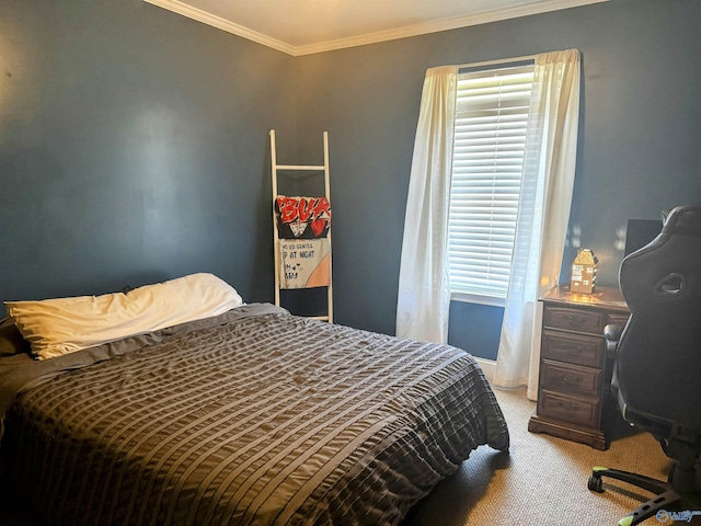 bedroom featuring crown molding and carpet floors