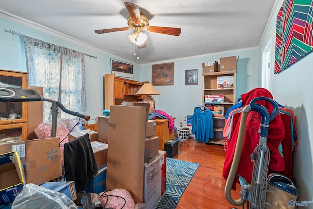 storage room with ceiling fan