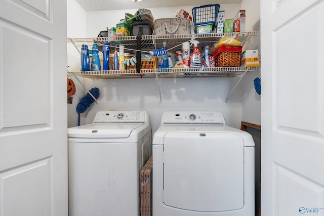 laundry room with laundry area and separate washer and dryer