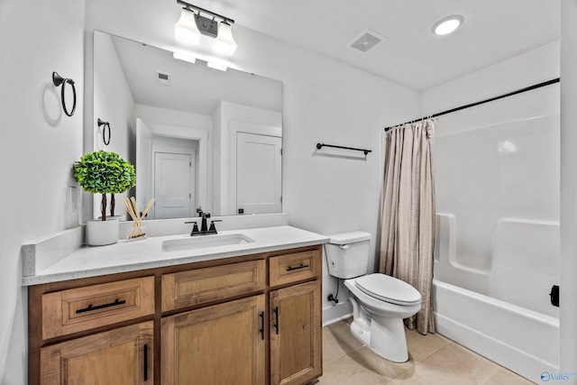 full bathroom featuring vanity, tile patterned floors, shower / bath combination with curtain, and toilet