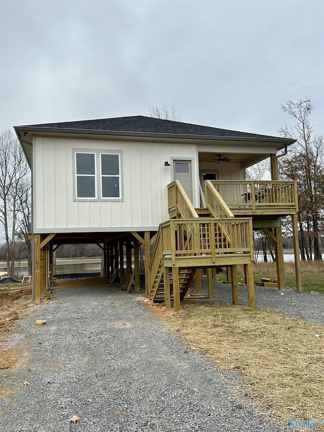 view of front of home featuring a carport and ceiling fan