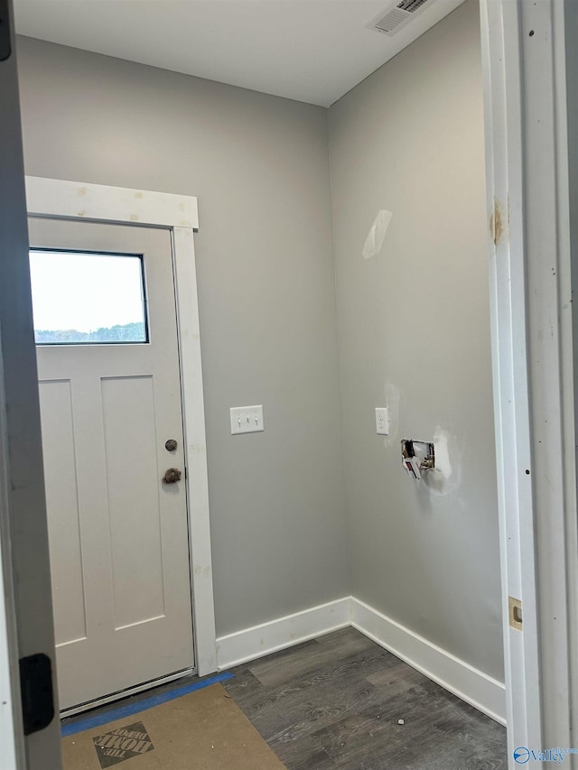 foyer entrance featuring dark hardwood / wood-style flooring