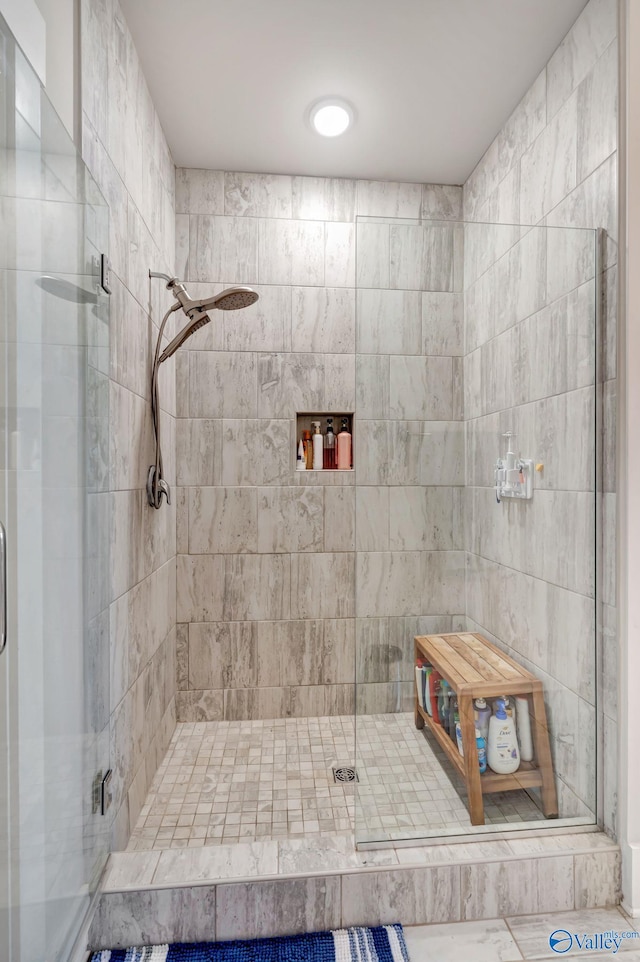 bathroom featuring a stall shower