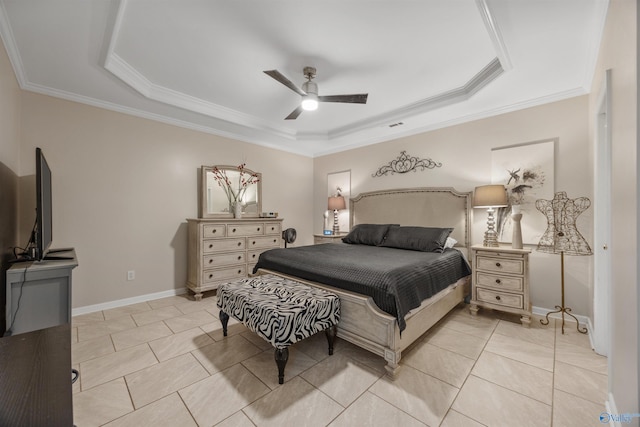 bedroom featuring light tile patterned floors, baseboards, ornamental molding, and a tray ceiling
