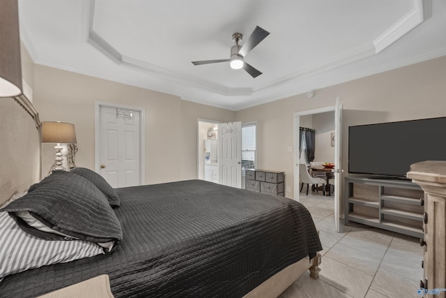 bedroom with ceiling fan, light tile patterned flooring, crown molding, and a tray ceiling