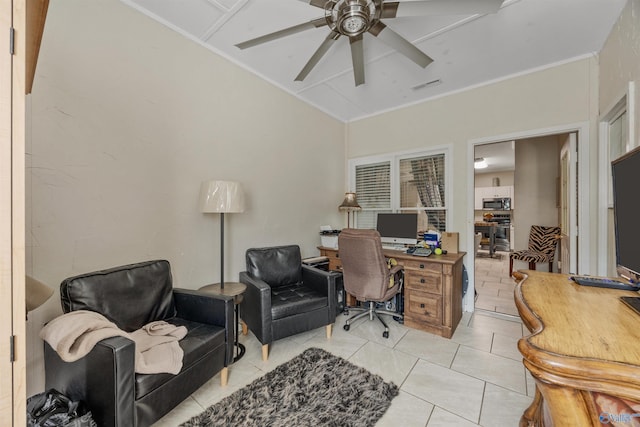 office featuring light tile patterned floors, crown molding, a ceiling fan, visible vents, and lofted ceiling