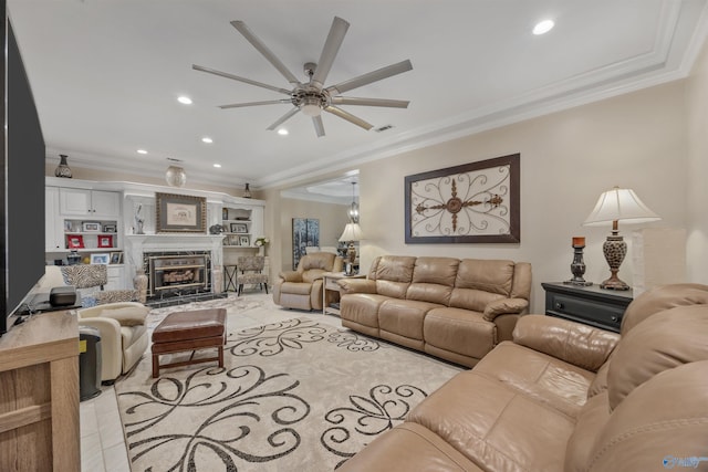 living area with visible vents, ornamental molding, ceiling fan, and recessed lighting