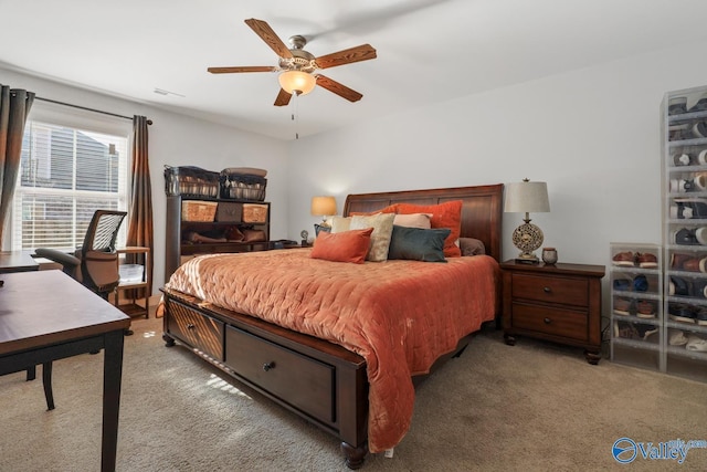 carpeted bedroom with ceiling fan