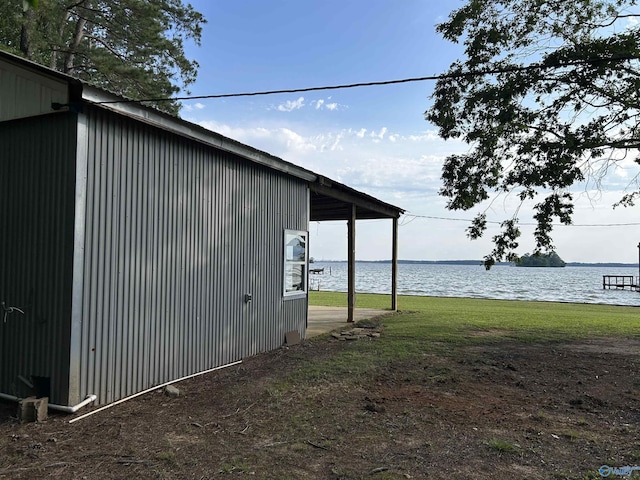 1165 Sunset Dr, Leesburg, AL 35983 - view of side of property featuring a lawn and a water view