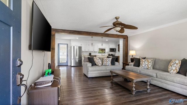 living room featuring crown molding, a textured ceiling, ceiling fan, and dark wood-style flooring