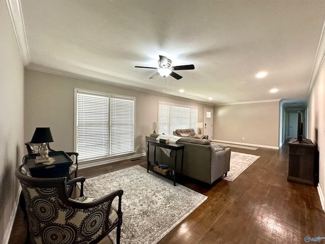 living room featuring ornamental molding, ceiling fan, and dark hardwood / wood-style flooring