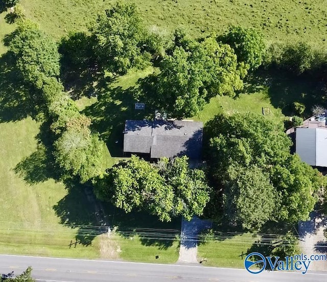 birds eye view of property featuring a rural view