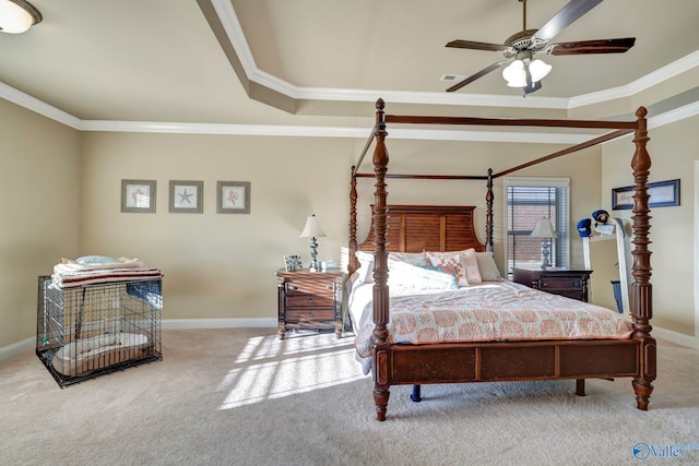 bedroom featuring ornamental molding, light colored carpet, and baseboards