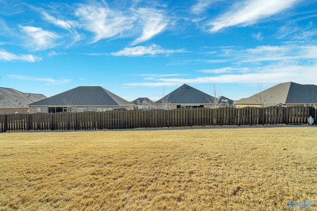 view of yard featuring a fenced backyard