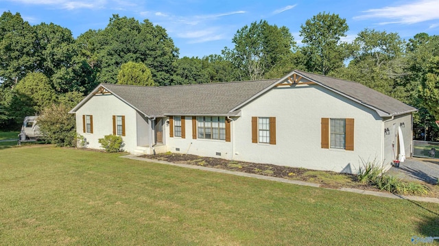 single story home featuring crawl space, brick siding, and a front lawn