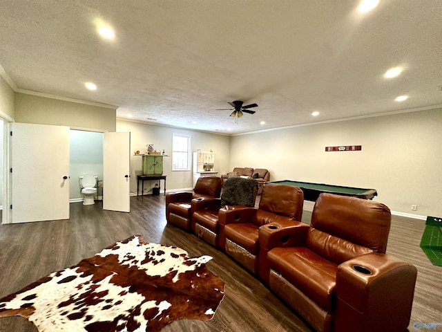 cinema with baseboards, a ceiling fan, ornamental molding, wood finished floors, and recessed lighting