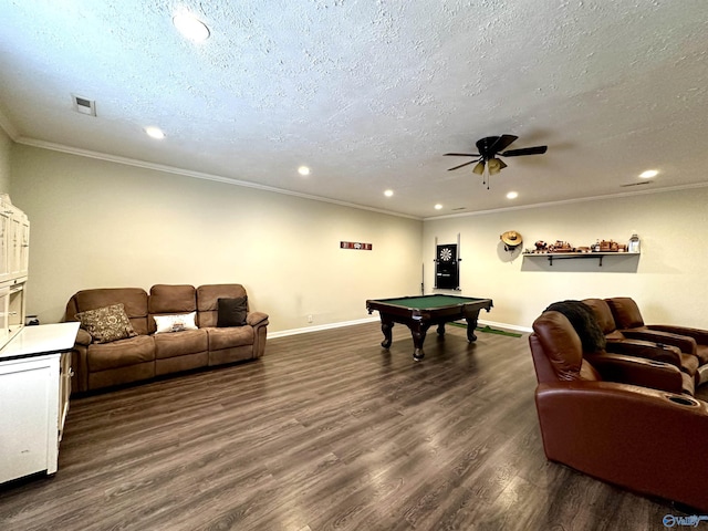 playroom featuring a textured ceiling, visible vents, dark wood-style flooring, and ornamental molding