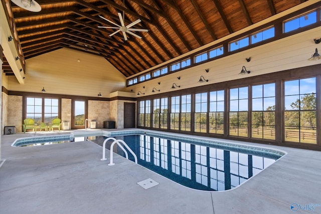 view of pool with a patio and an indoor hot tub