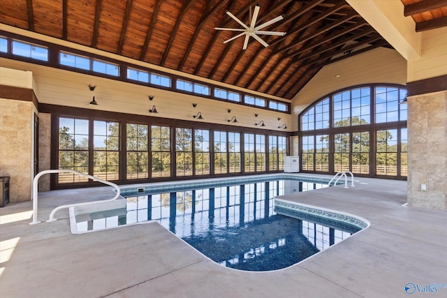 view of swimming pool with a patio and ceiling fan