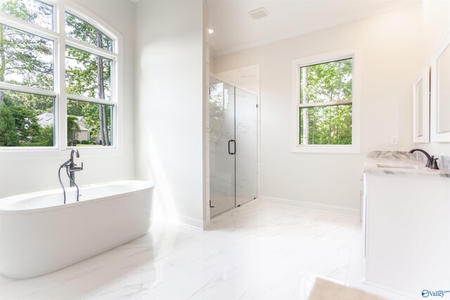 bathroom with tile patterned floors and plenty of natural light